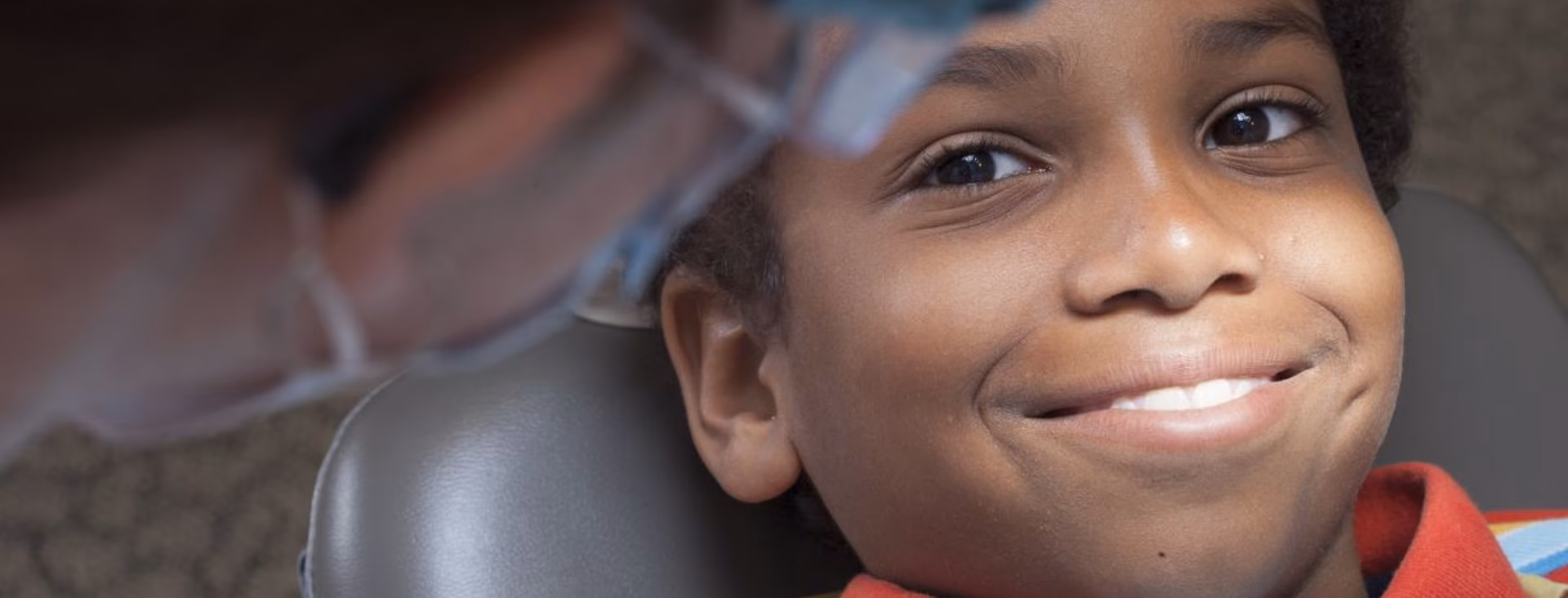 Smiling boy at a dental checkup